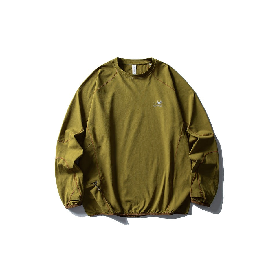 Mustard olive green long-sleeve crew-neck top flat lay with orange-brown contrast stitching and binding