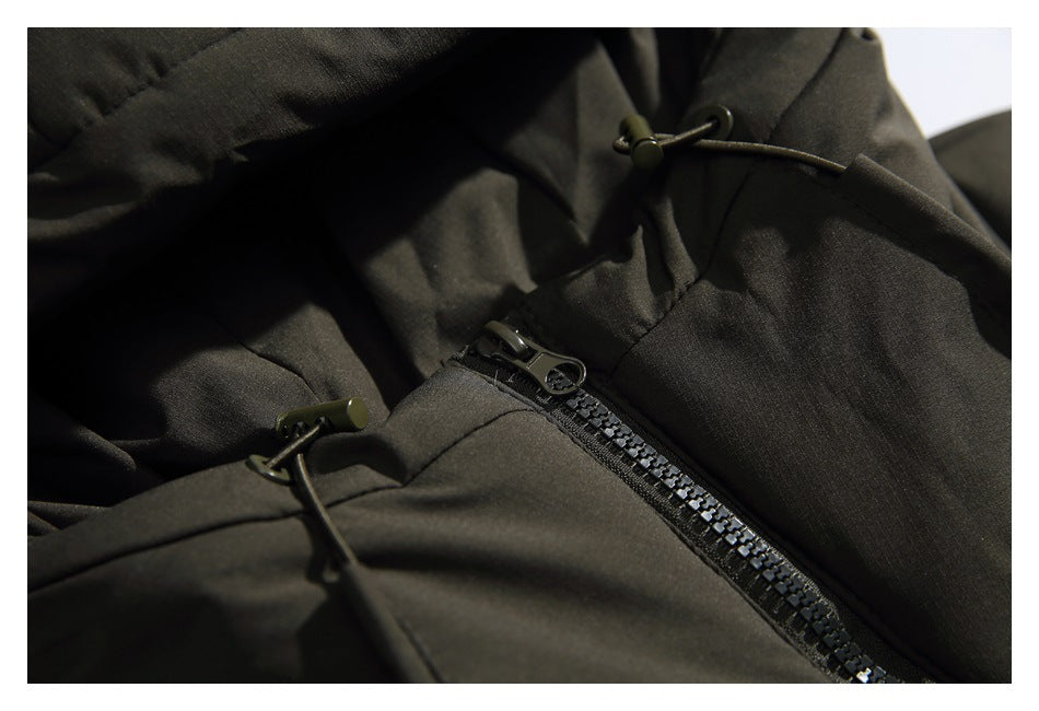 Close-up of a dark charcoal jacket with a black zipper and adjustable drawcord toggles.