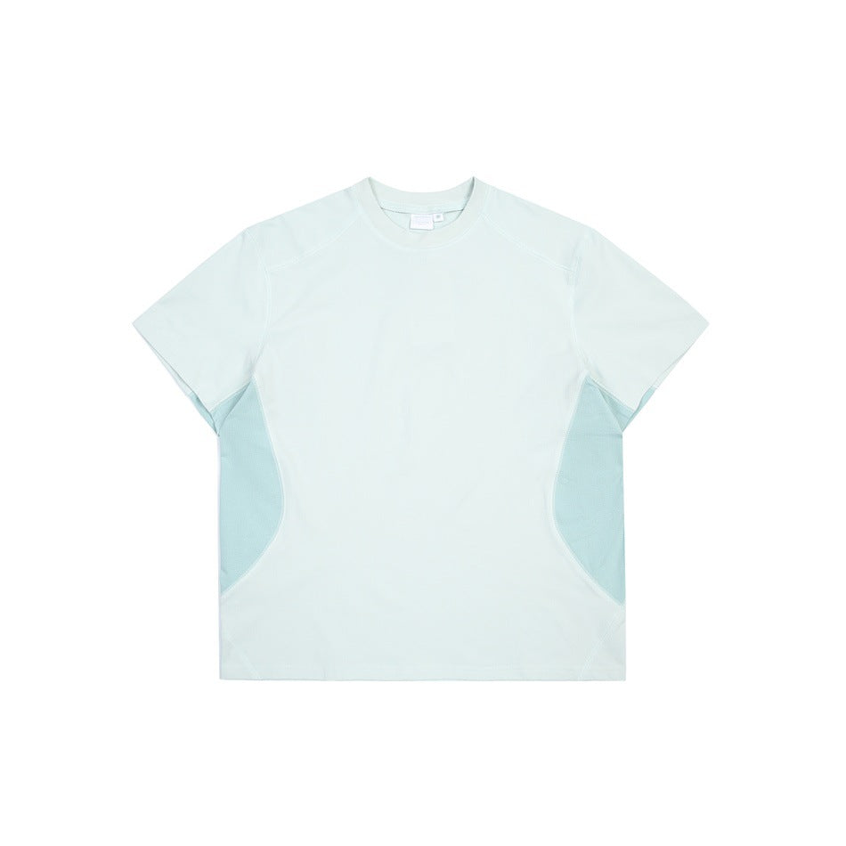 Front view of a pale mint short-sleeve crew-neck shirt with light blue-green curved side panels.