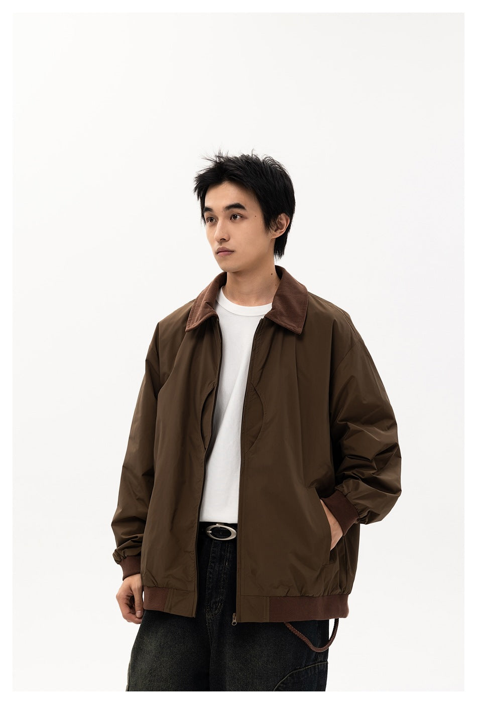 Male model wears an open dark brown jacket with a brown corduroy collar, ribbed cuffs and hem.