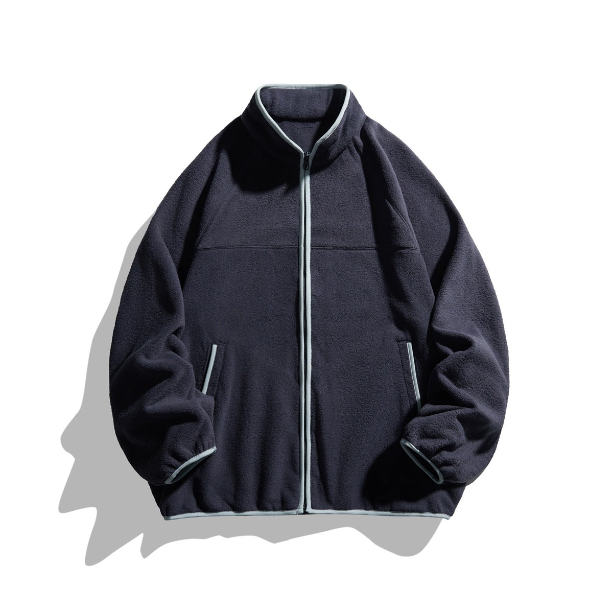 Navy fleece-textured zip jacket with light blue-gray contrast trim, stand collar and slash pockets, front view
