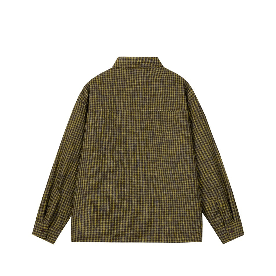 Back view of a brown and mustard plaid long-sleeve button-up shirt laid flat.