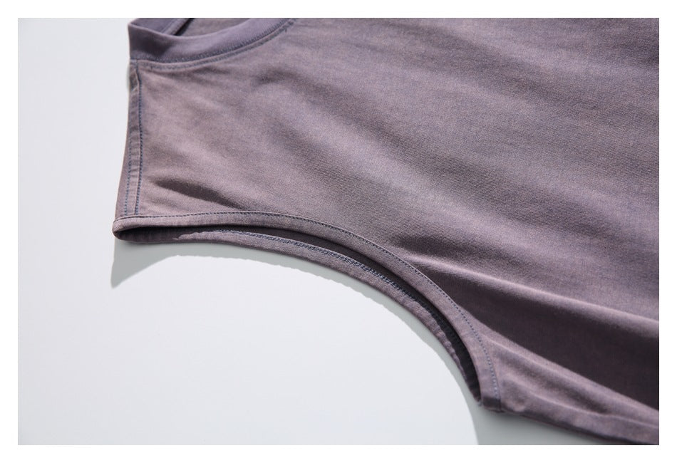 Close-up of the sleeveless shirt's bound armhole and side seam.