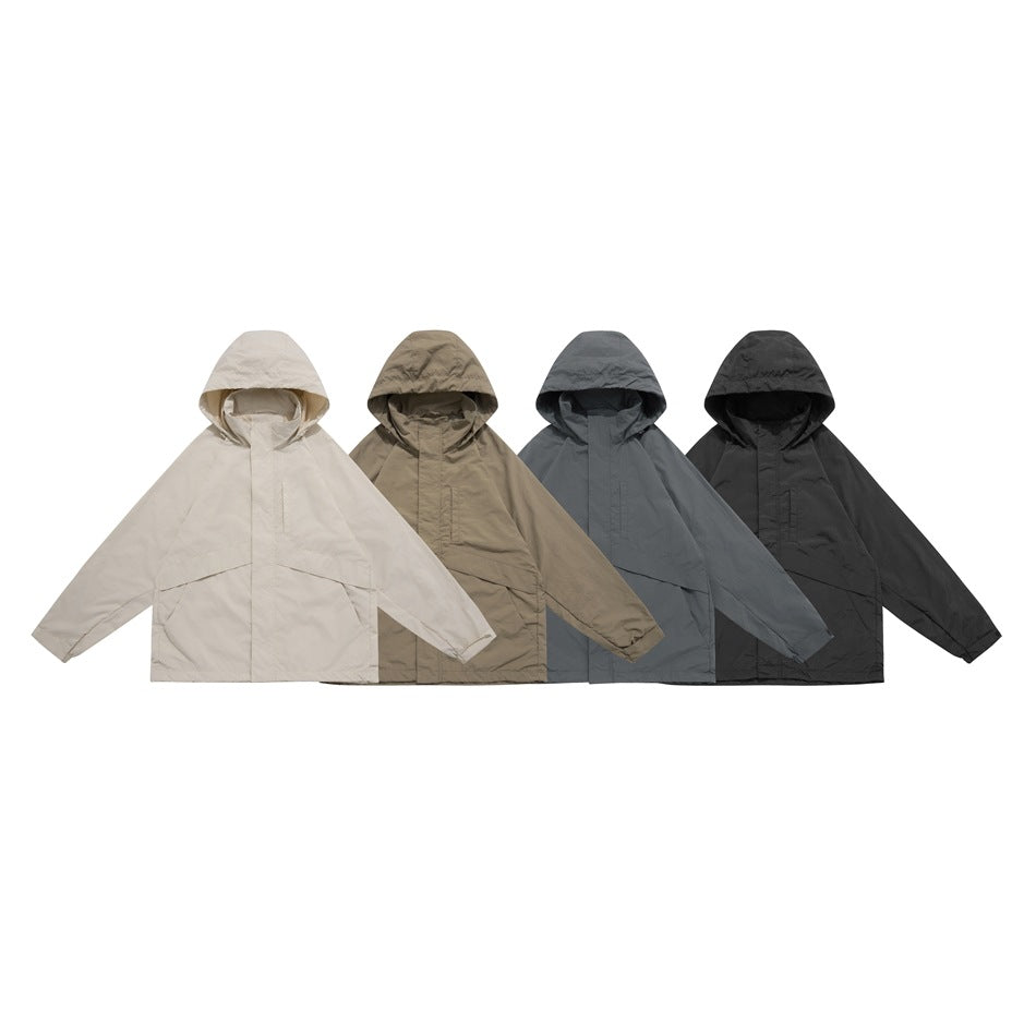 Four hooded jackets displayed together in cream, taupe, slate blue-gray and black.