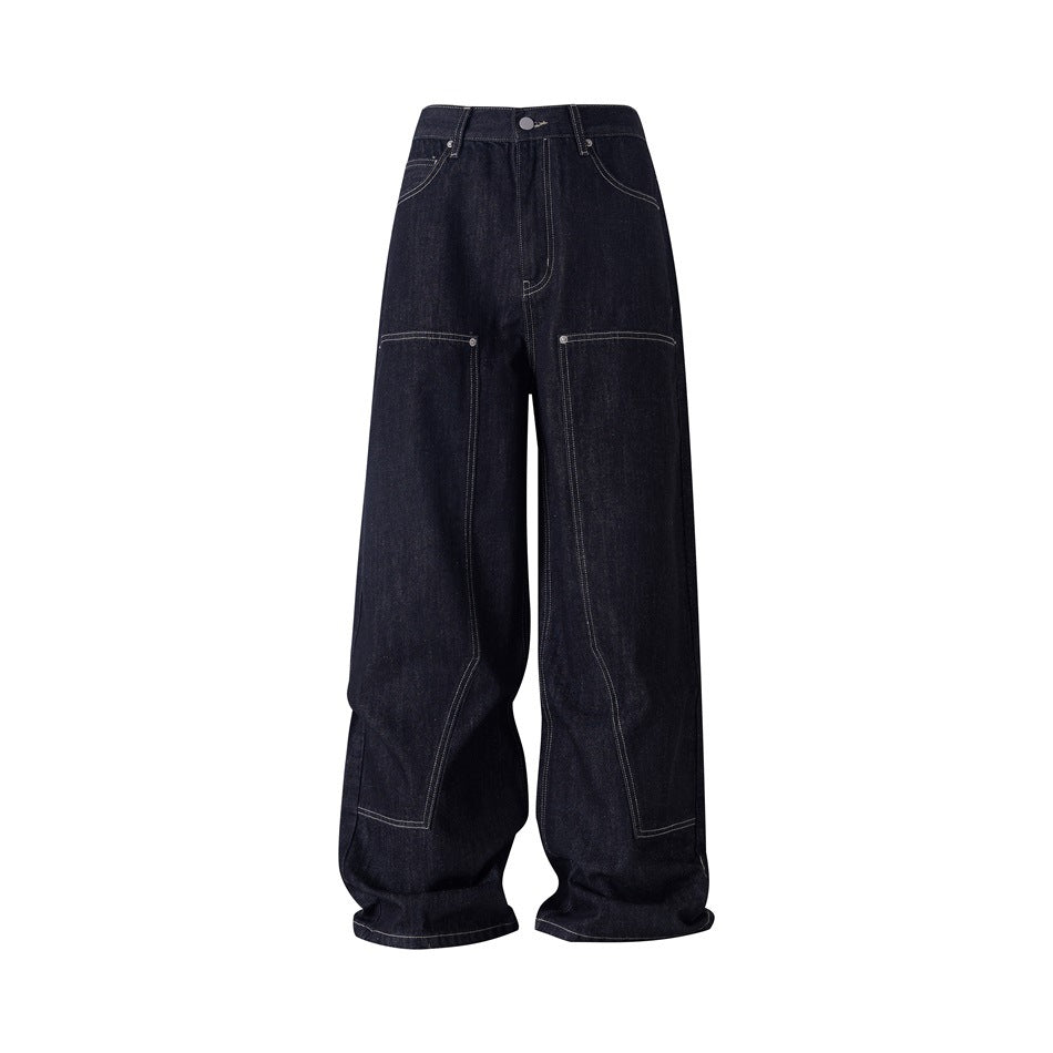 Dark indigo wide-leg jeans with contrast stitching and knee panel seams, front view on white background