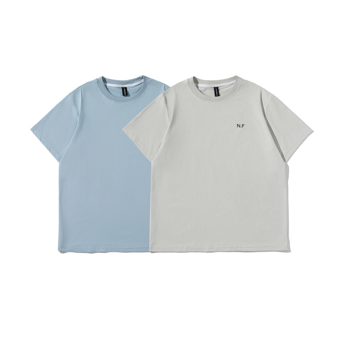 Front view of light blue and light gray short-sleeve crew-neck T-shirts; the gray shirt has a small N.F chest print.