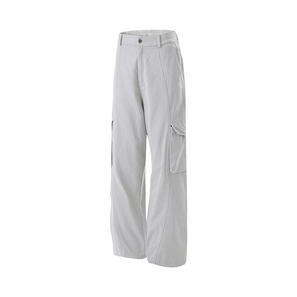 Light gray wide-leg trousers with a button waist, belt loops, and a large side cargo pocket, shown against white.