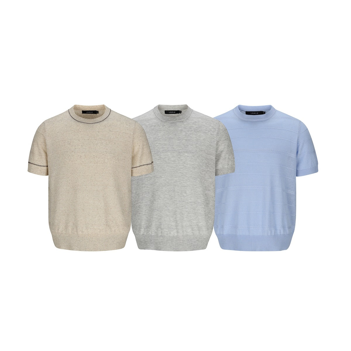 Three short-sleeve knit crewneck shirts in beige, heather gray, and light blue, shown from the front.
