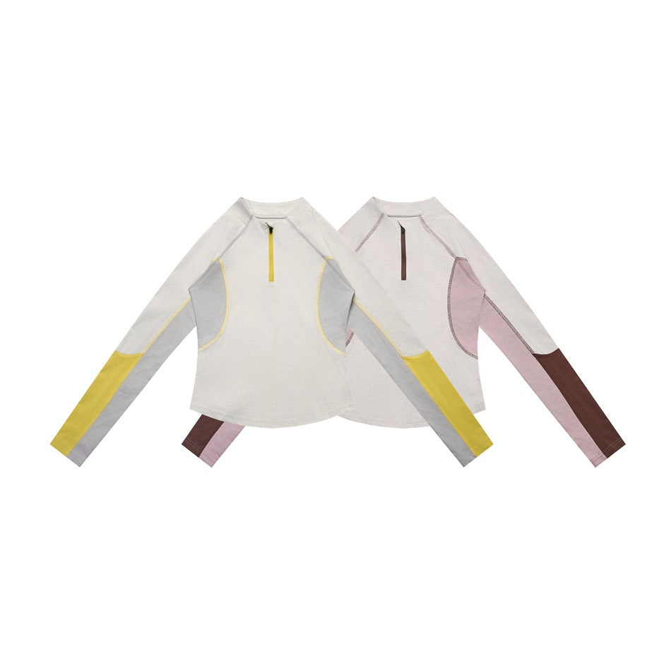 Two long-sleeve quarter-zip tops shown from the front: one gray and yellow, the other pink and brown.