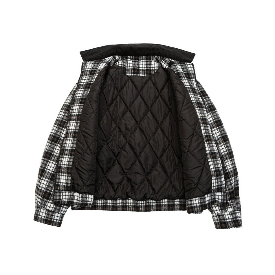 Jacket shown open from the back, revealing a black diamond-quilted lining and plaid outer panels.