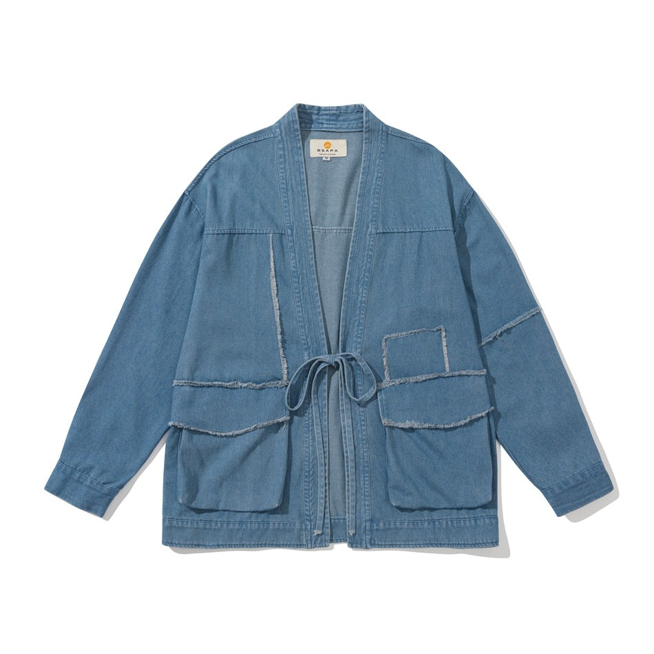 Light-blue denim-look open-front jacket with waist tie, large front pockets and frayed seam details