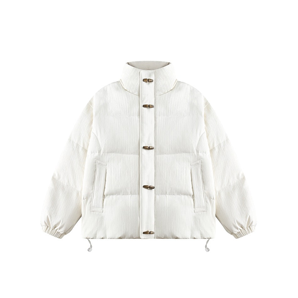 Beige puffer-style jacket with stand collar, brass toggle closures, slanted pockets and elastic cuffs, front view