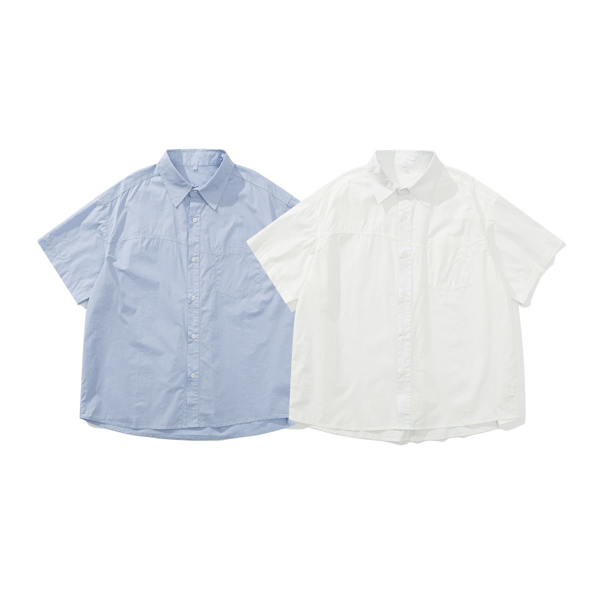 Two short-sleeve button-up shirts shown from the front, one pale blue and one white; each has a chest pocket.