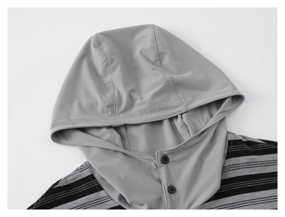 Close-up of the light gray hood, buttoned neck panel, and striped shoulder of the top.