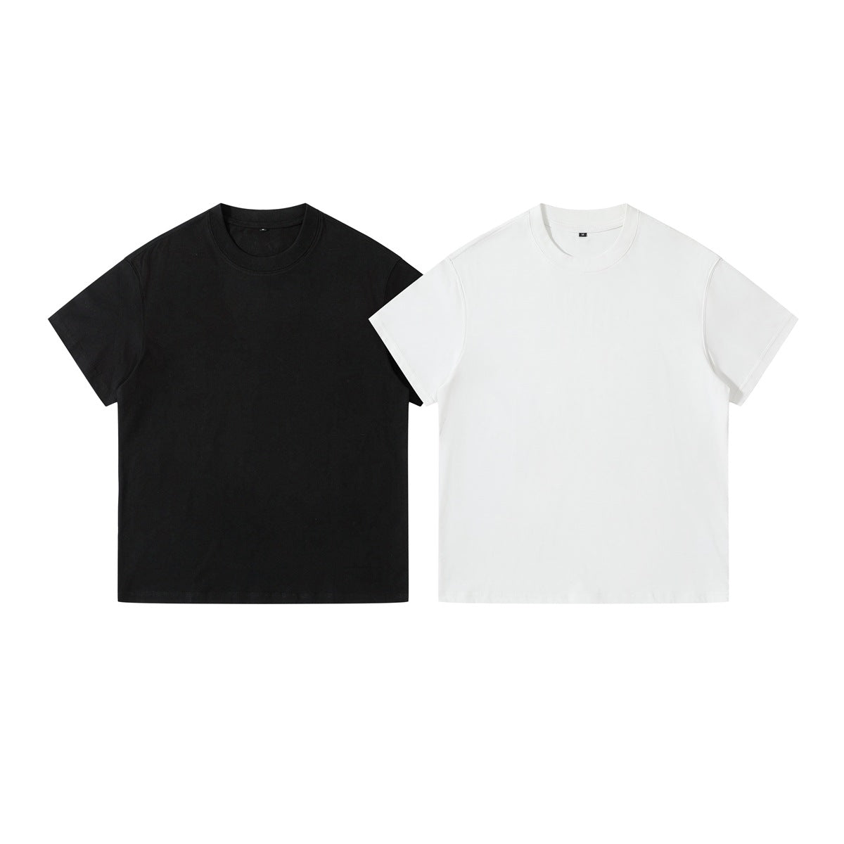Front view of two plain crew-neck T-shirts, one black and one white.
