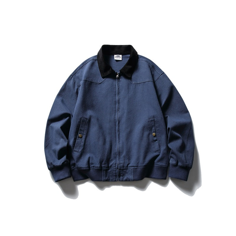 Front view of a navy zip jacket with a black collar, ribbed cuffs and hem, and snap-tab pockets.