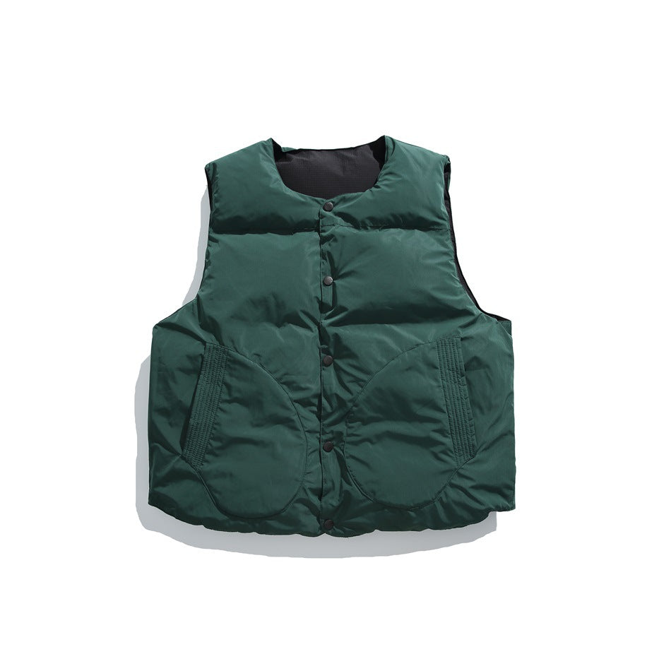 Dark green padded vest with snap-button front and two large rounded pockets.