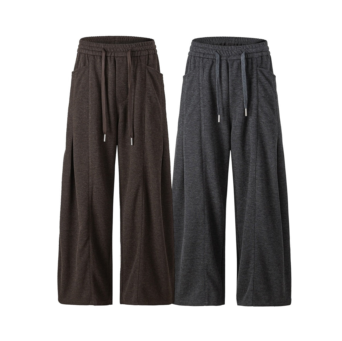 Front view of wide-leg pants in dark brown and charcoal, with elastic drawstring waists and side pockets.