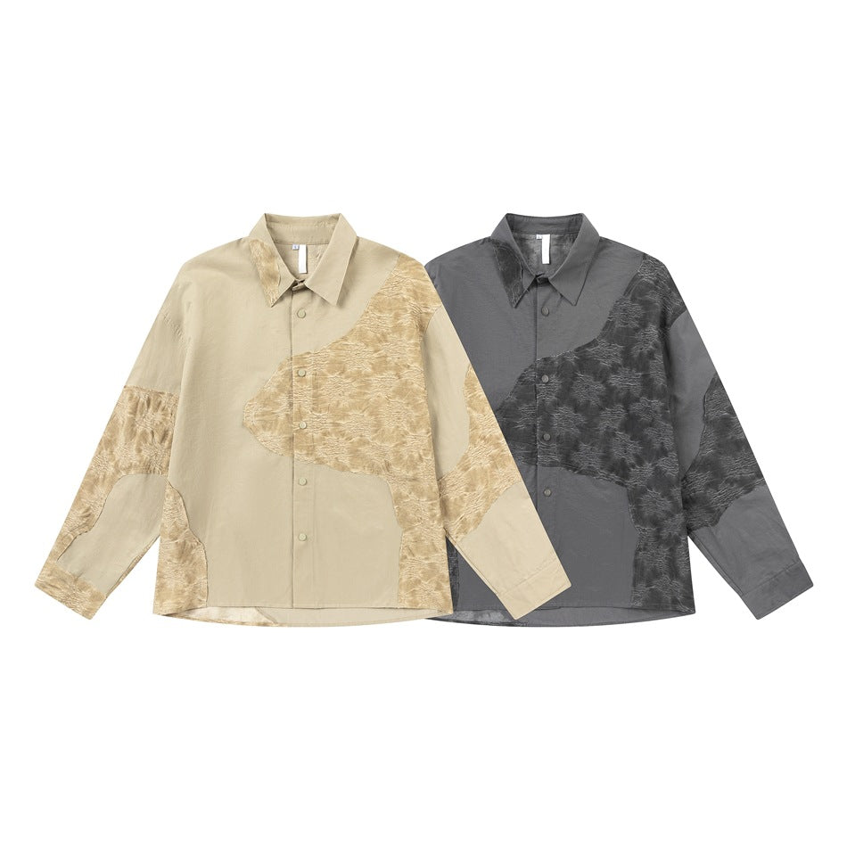 Two button-up shirts displayed flat: one beige with tan textured panels and one charcoal gray with dark panels.
