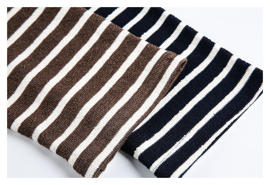 Close-up of the striped knit cuffs in brown and black colorways.