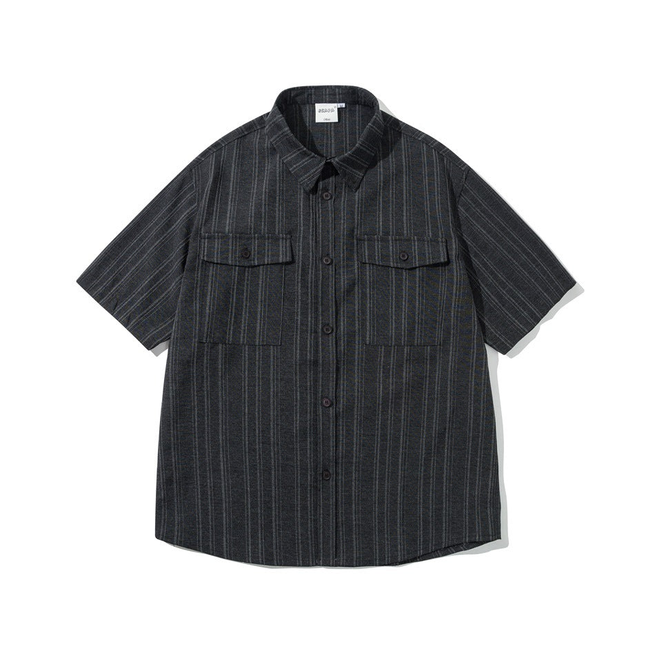 Black striped short-sleeve button-up shirt with two flap chest pockets, flat lay front view