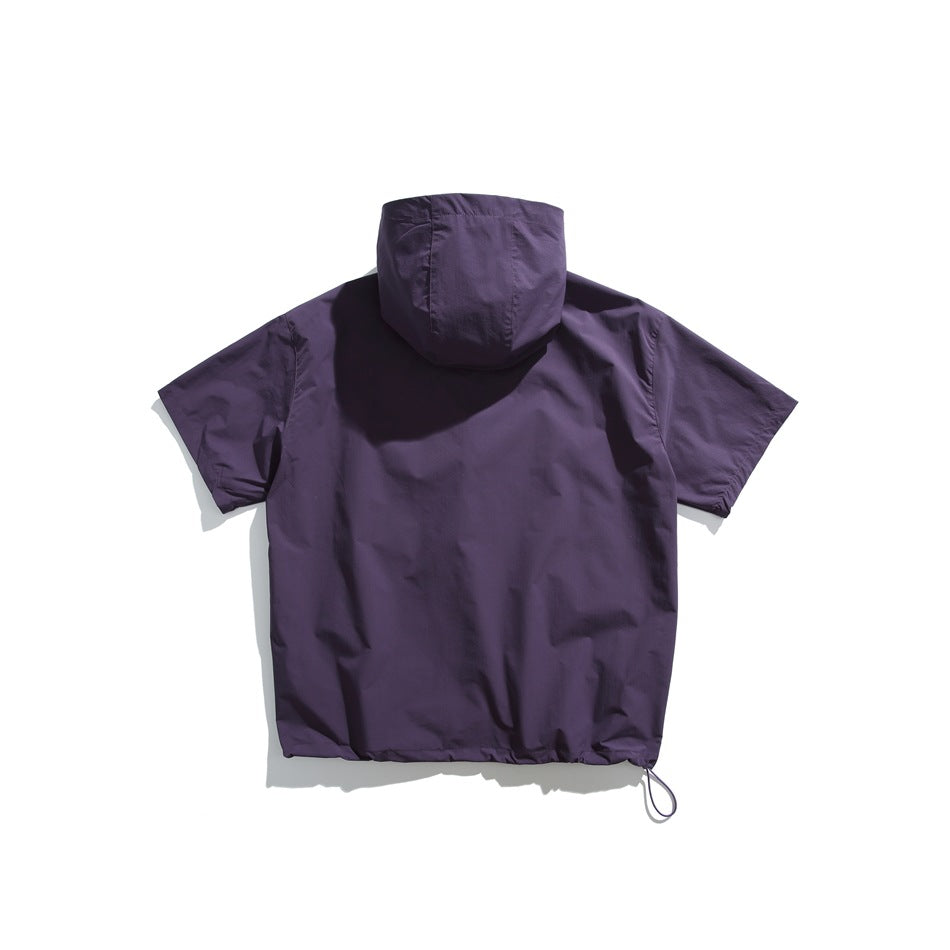 Back view of purple short-sleeve hooded top with plain back, hood seams and drawcord hem