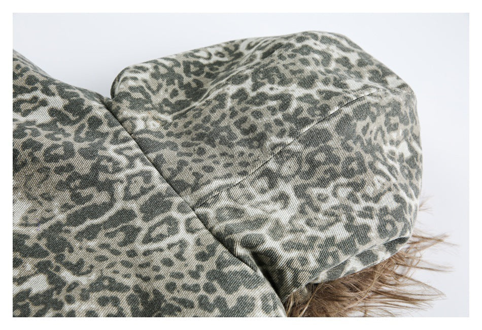 Close-up of the animal-print hood with a brown fur-trimmed edge.