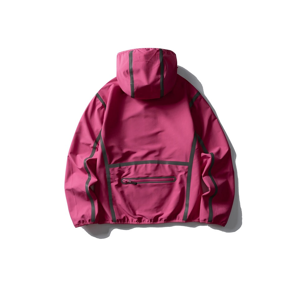 Back view of a bright pink hooded jacket with dark contrast seam trim and a horizontal zip pocket.