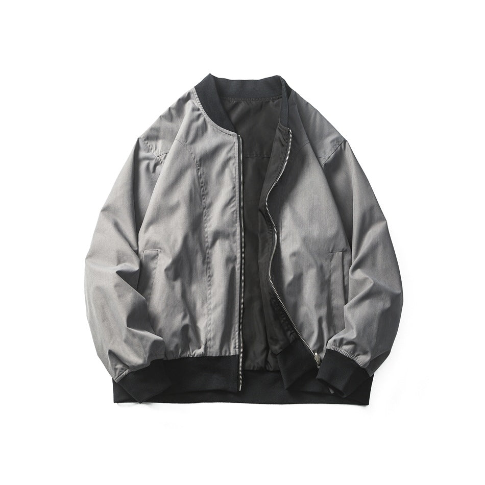 Gray bomber jacket shown open, revealing its dark lining and center zipper with black ribbed trim.