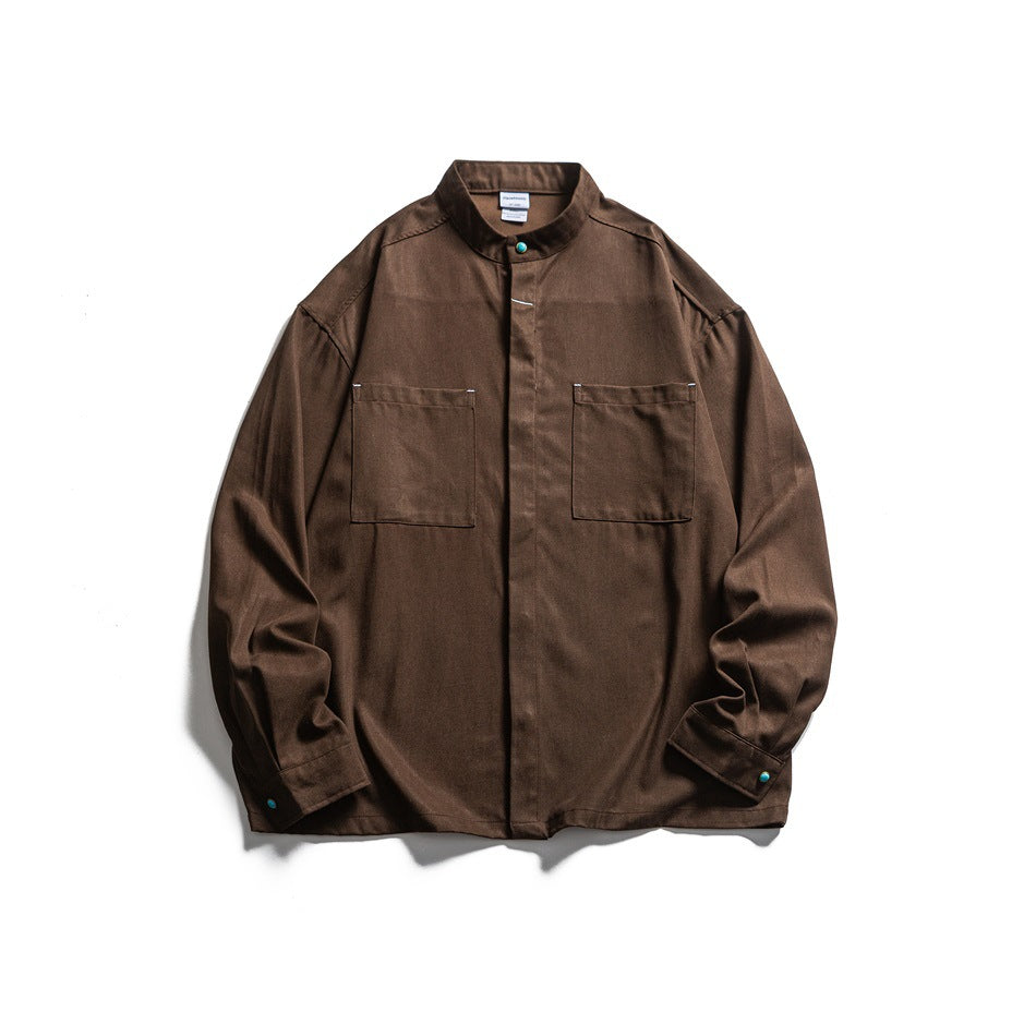 Brown stand-collar long-sleeve shirt, front flat lay with two chest pockets and turquoise-green snaps