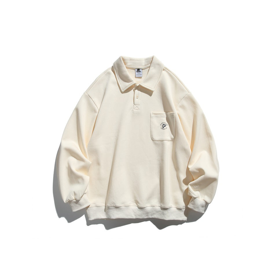 Apricot long-sleeve polo-collar sweatshirt flat lay with chest pocket and small circular logo, ribbed cuffs and hem