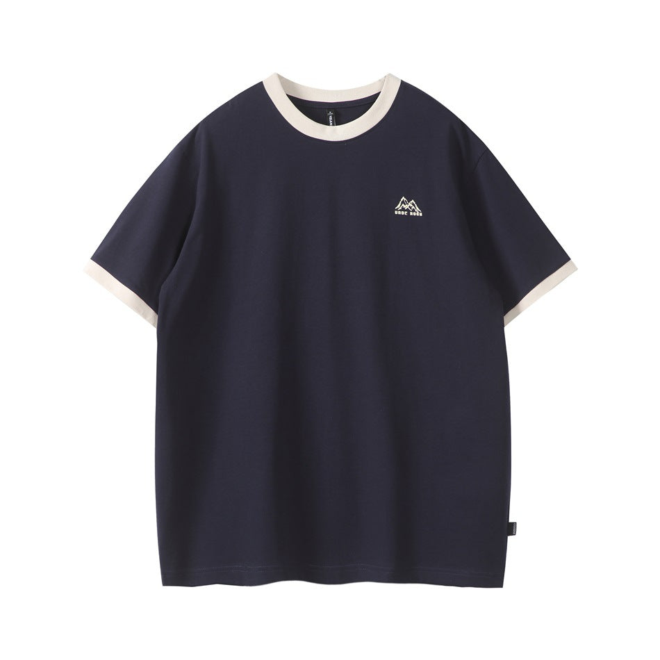 Navy short-sleeve crew-neck T-shirt front with cream collar and cuffs and small embroidered mountain logo on chest