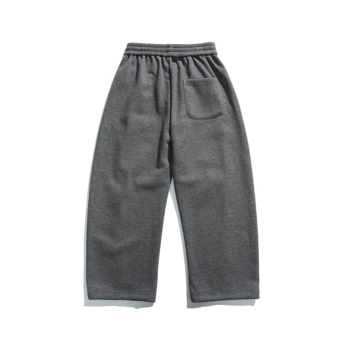 Back view of charcoal pants laid flat, with an elastic waistband and one patch pocket.