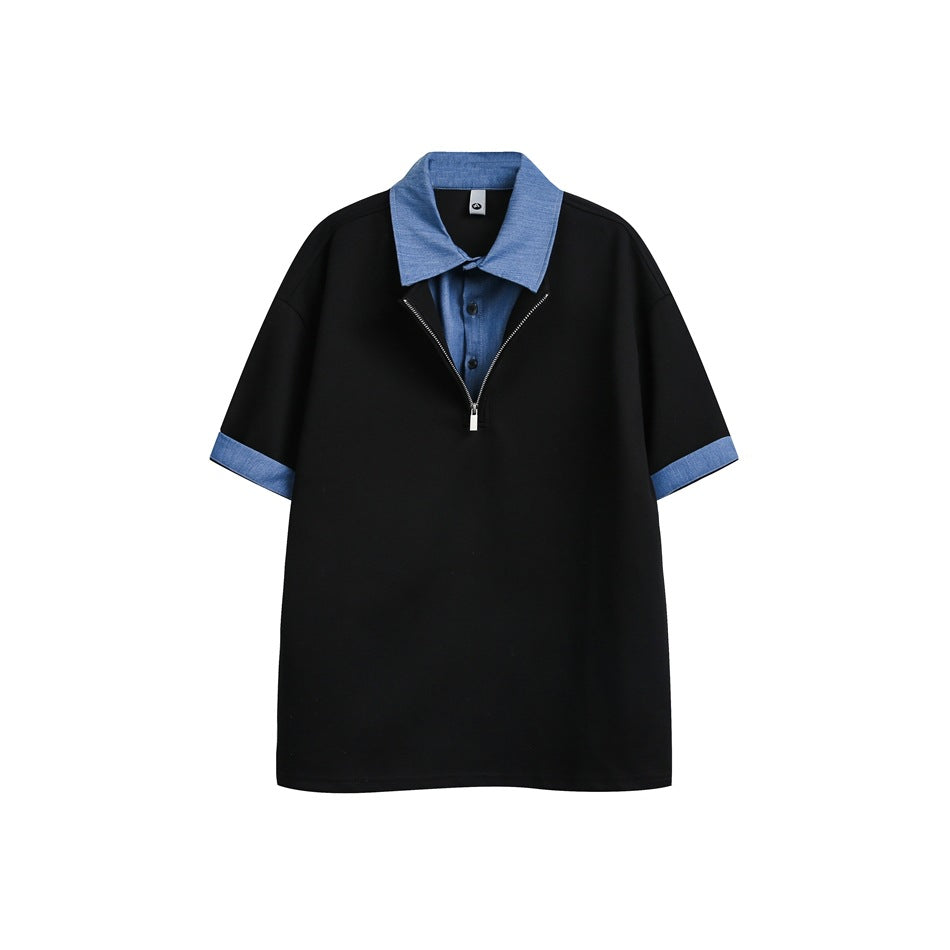 Black short-sleeve half-zip polo top with blue denim-look collar, placket and cuffs, flat front view