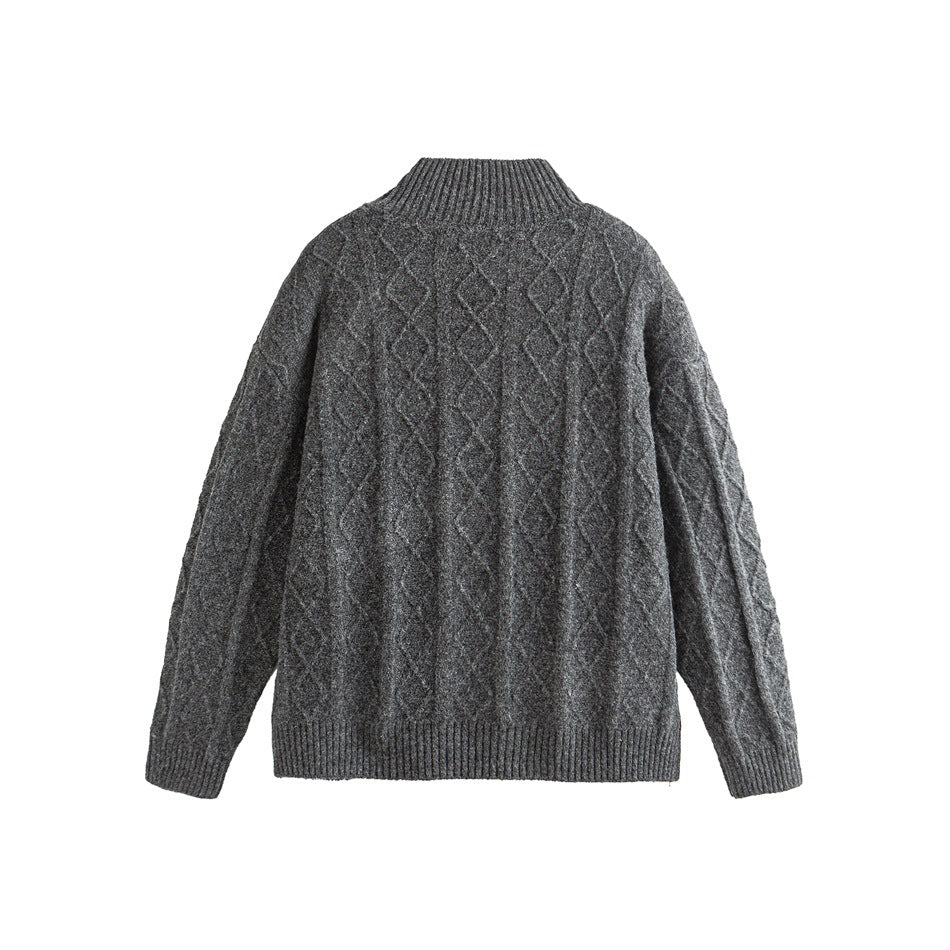 Back of a charcoal gray knit cardigan with raised diamond patterns and ribbed collar, cuffs, and hem, shown flat.