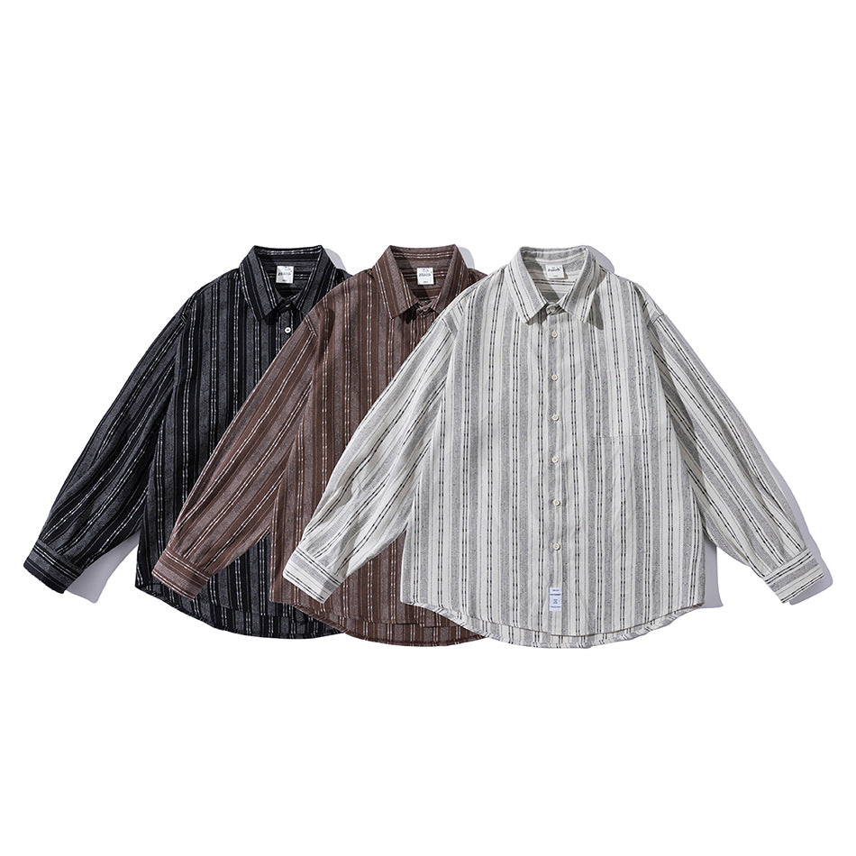 Three long-sleeve button-up shirts with vertical stripes in black, brown, and light gray.