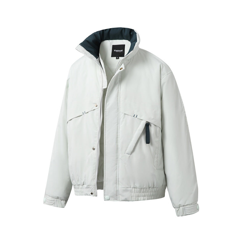 White high-collar jacket shown from the front, with a dark collar lining, snap placket and large flap pockets.