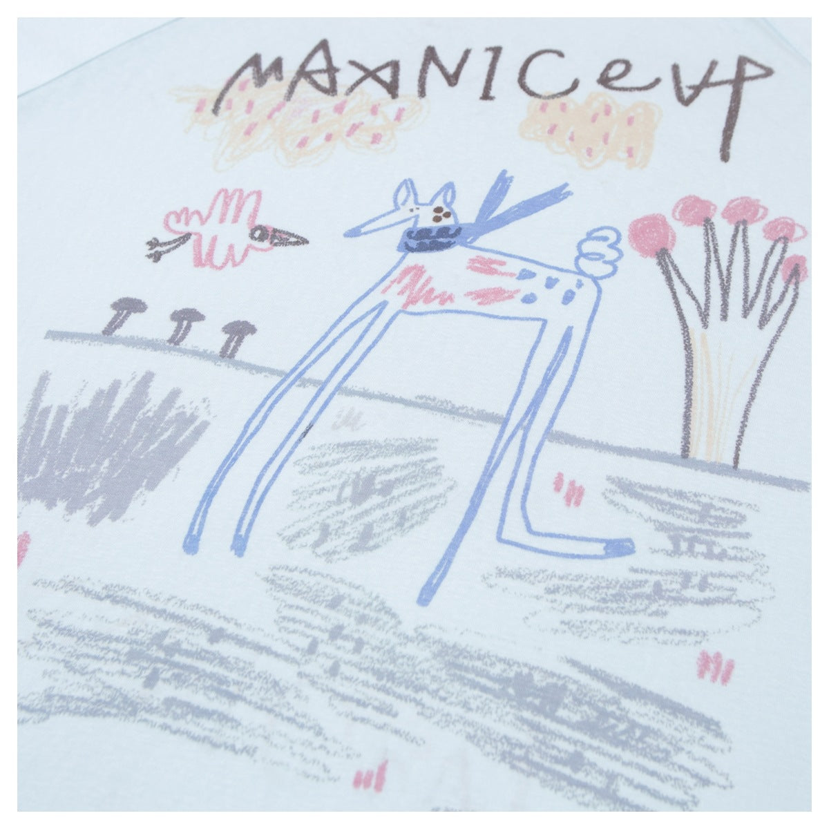 Close-up of colorful hand-drawn-style graphics and lettering printed on a pale blue T-shirt.