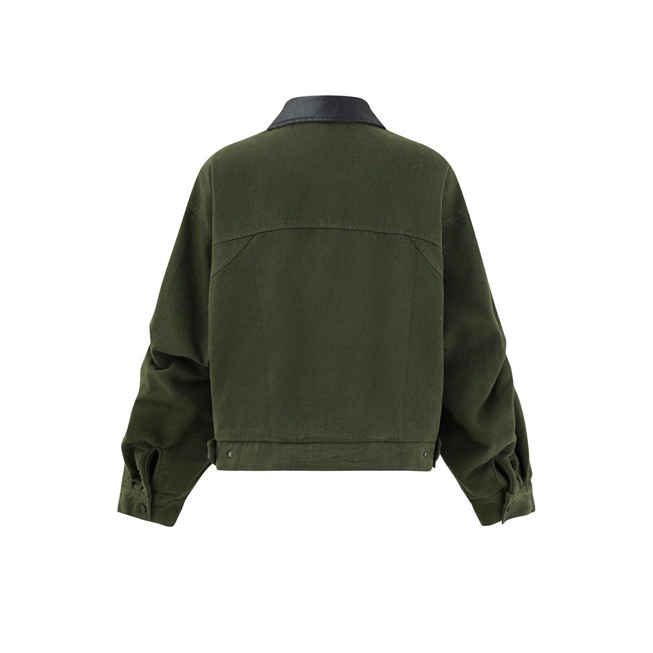 Back view of an olive green jacket with a black collar, a curved shoulder yoke seam, and long sleeves.