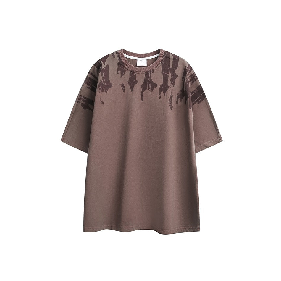 Muted purple-brown short-sleeve crewneck T-shirt with dark distressed drip print at shoulders, flat front view