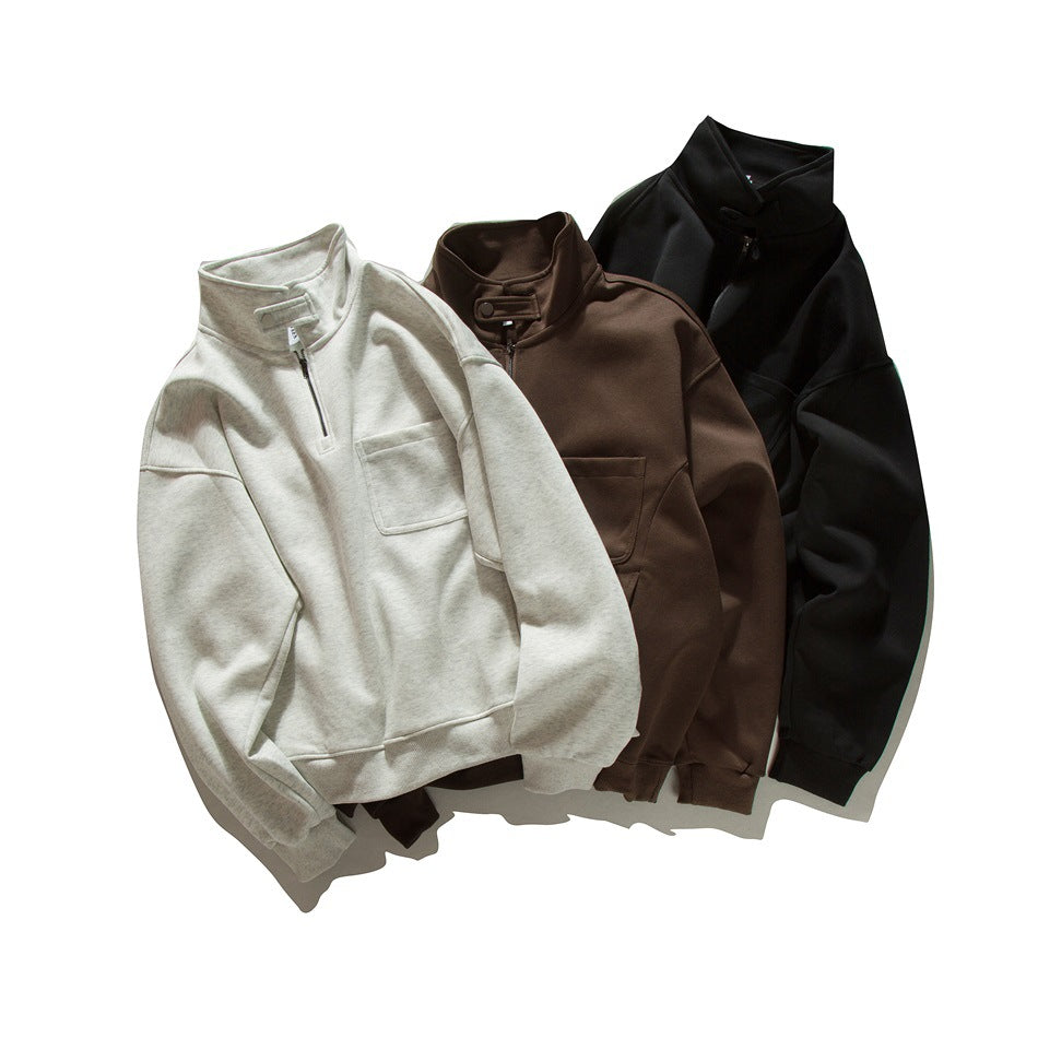 Three quarter-zip sweatshirts with high collars and chest pockets, shown in off-white, brown, and black.