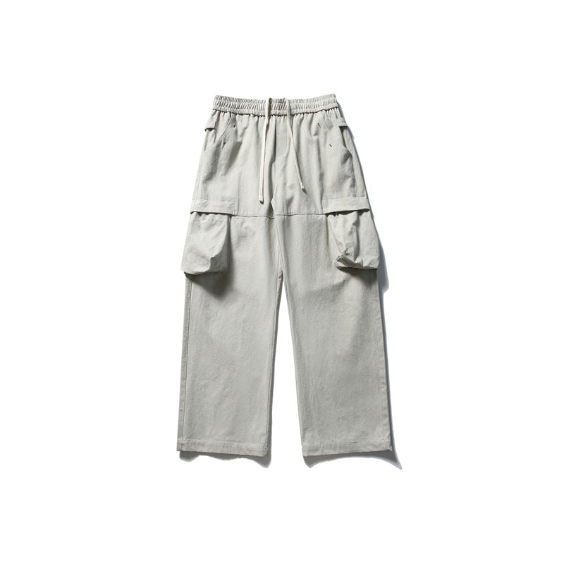 Beige-gray wide-leg cargo pants with drawstring waist and large side cargo pockets, flat lay front view