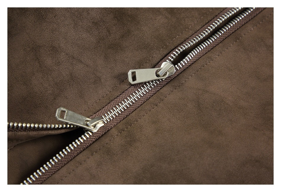 Close-up of the brown jacket's silver zipper and brown zipper tape.