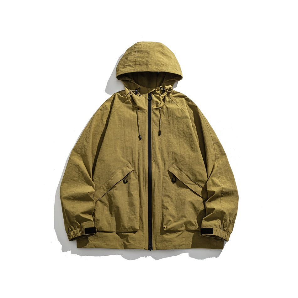 Khaki yellow hooded zip jacket with drawcord hood, large flap pockets and elastic cuffs, flat lay