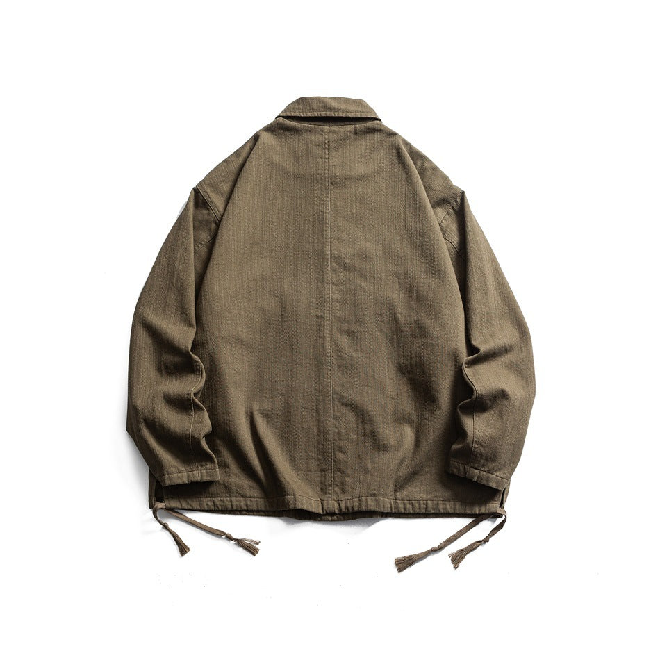 Back view of an olive-brown jacket with a collar, long sleeves, and dangling hem ties, laid flat on white.