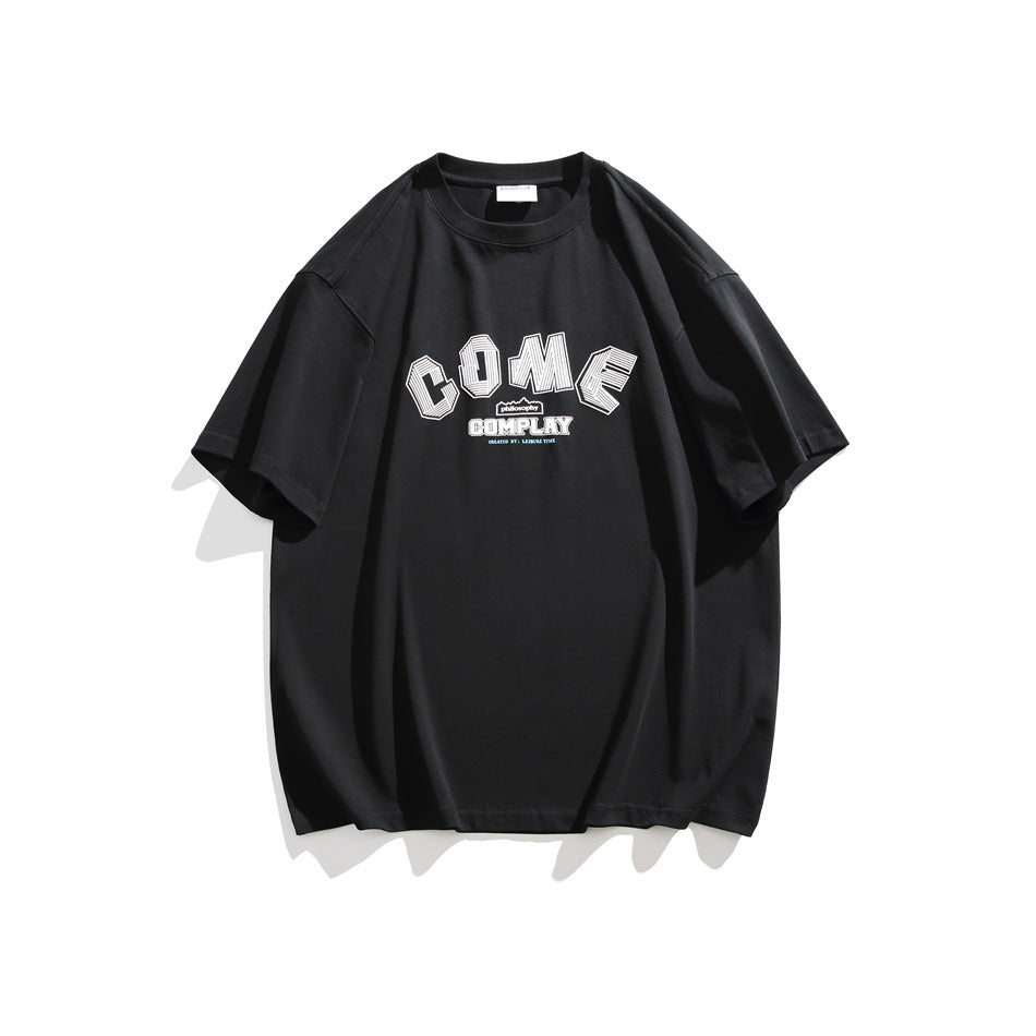 Black short-sleeve crew-neck T-shirt with white arched COME COMPLAY graphic on the chest, flat lay