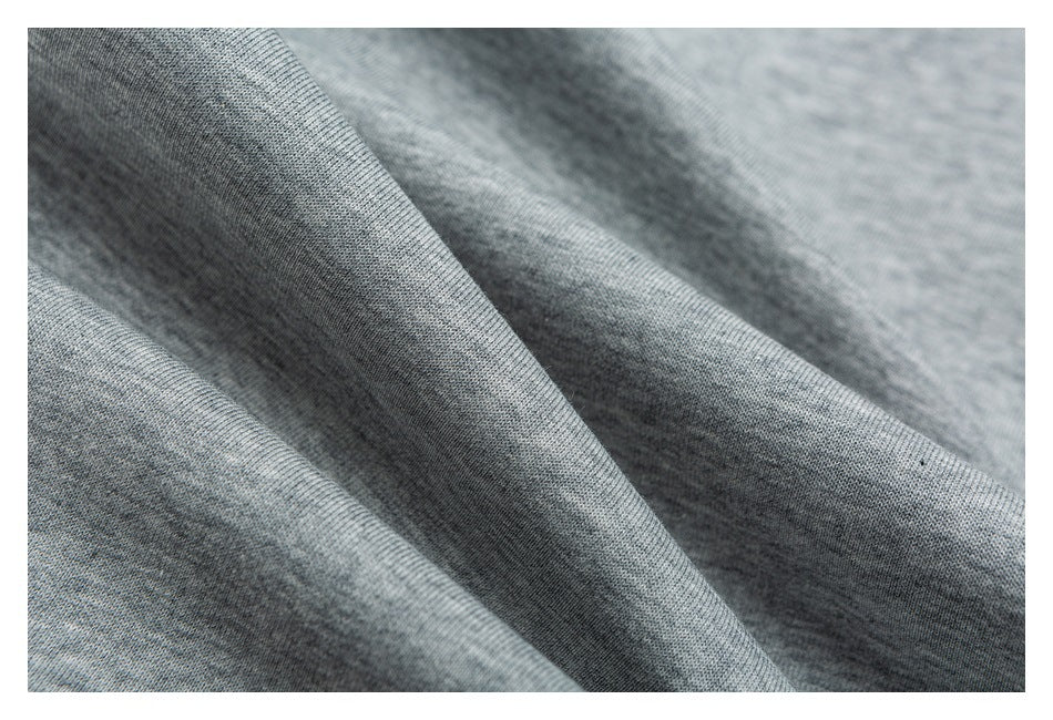 Close-up showing the heathered gray fabric texture and folds of the garment.