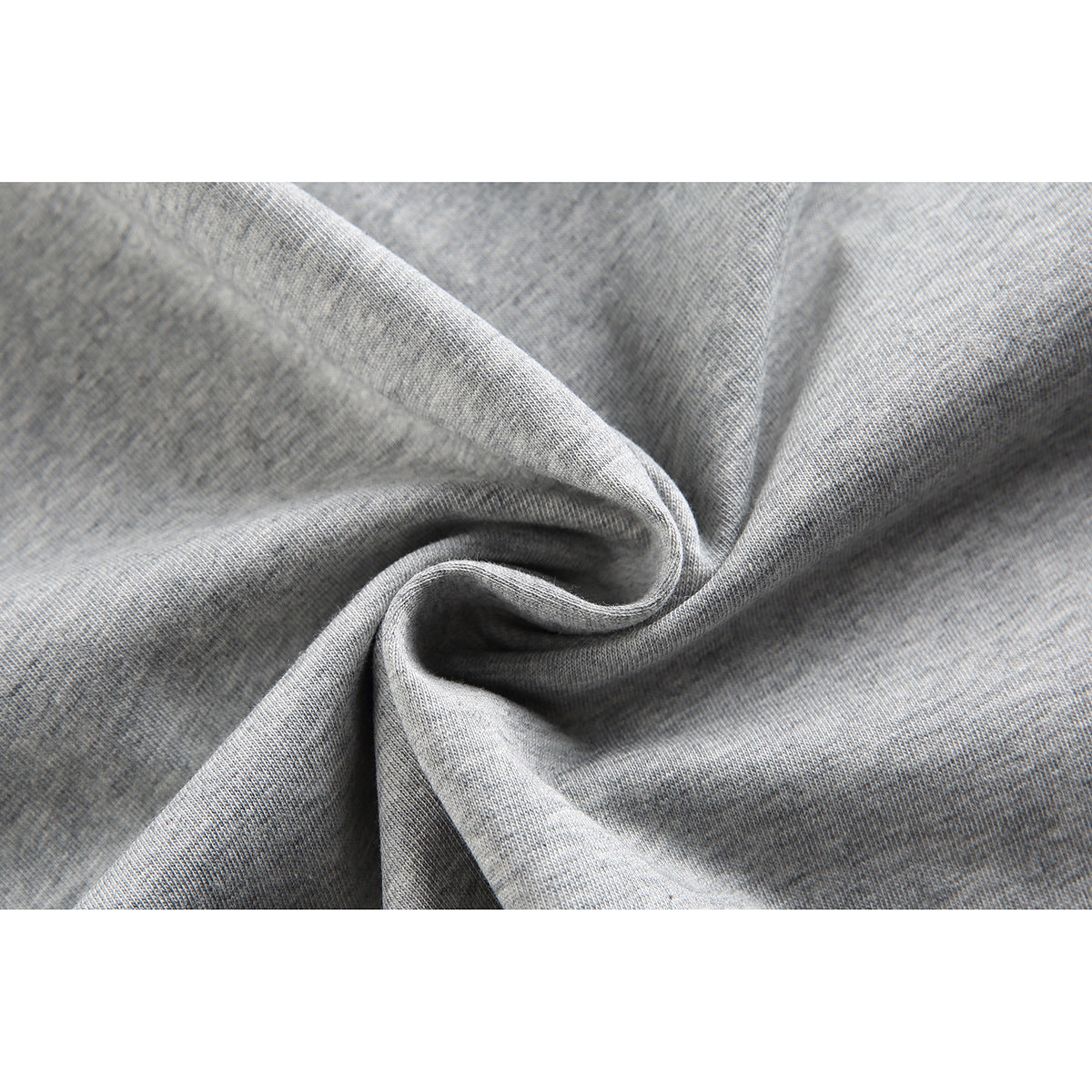 Close-up of heather gray knit fabric gathered to show its texture and drape.