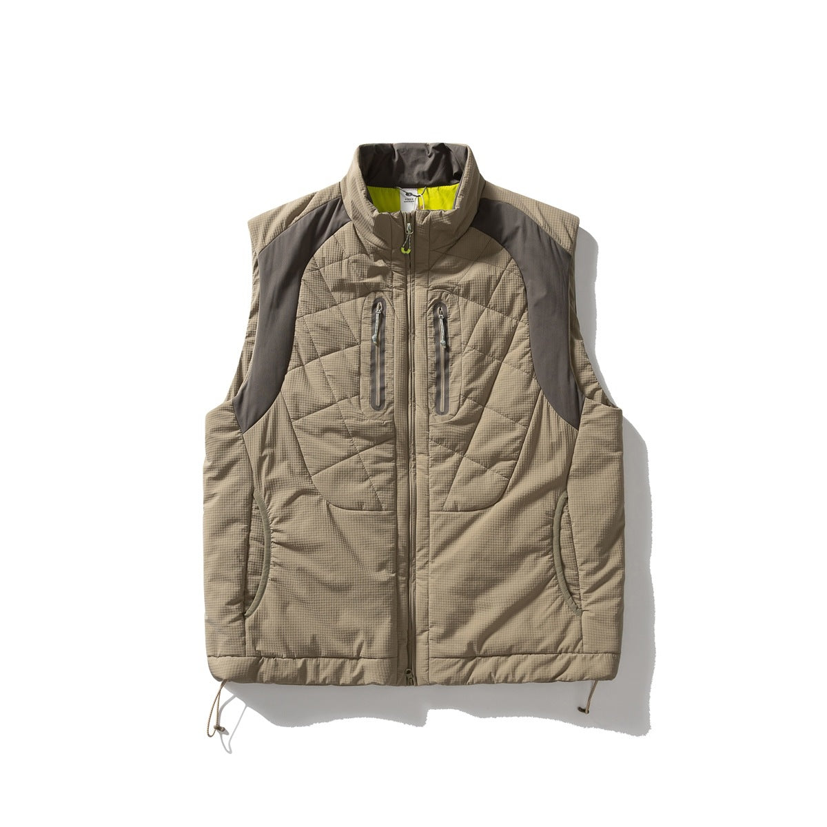 Khaki quilted sleeveless vest with brown-gray shoulder panels, zip chest pockets and lime collar interior