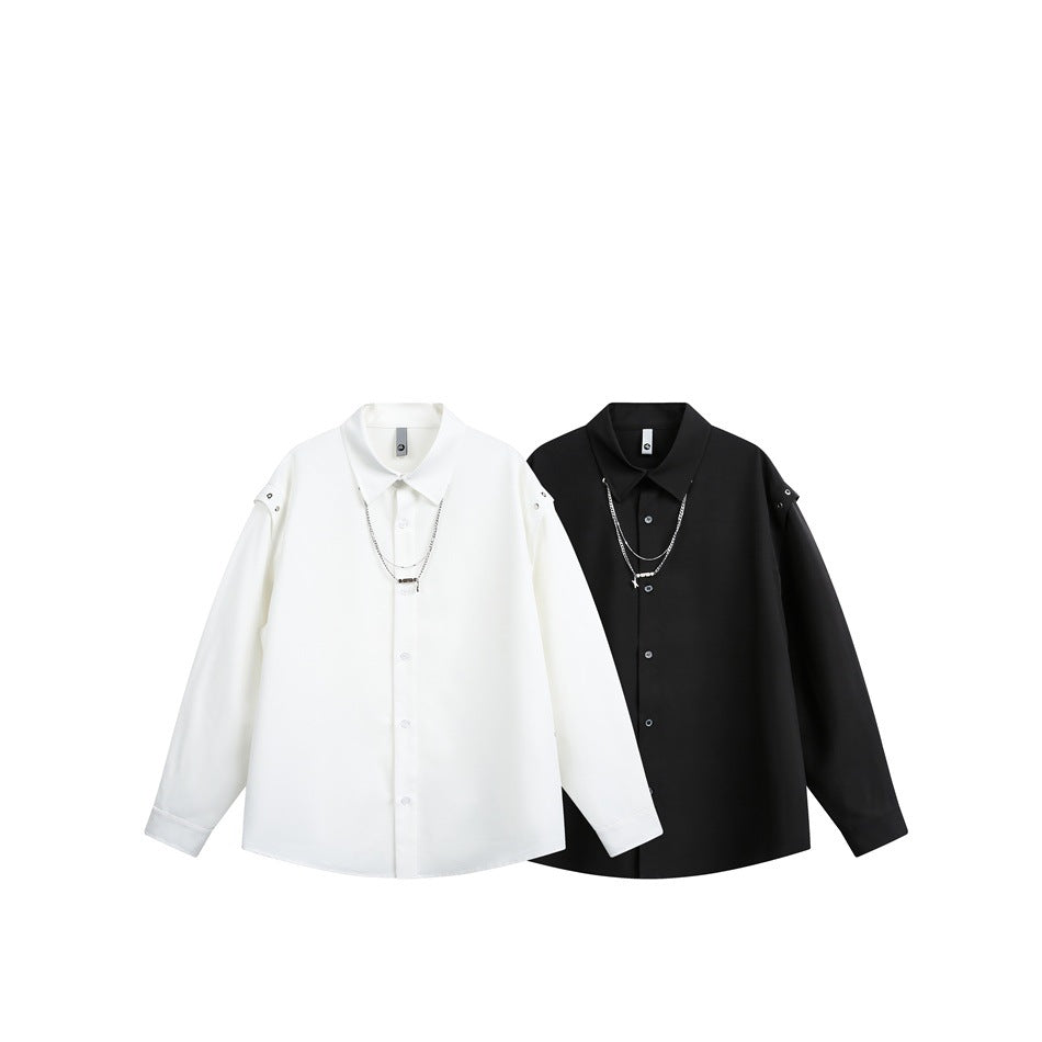 White and black button-front shirts displayed side by side, each with shoulder snaps and layered chains.